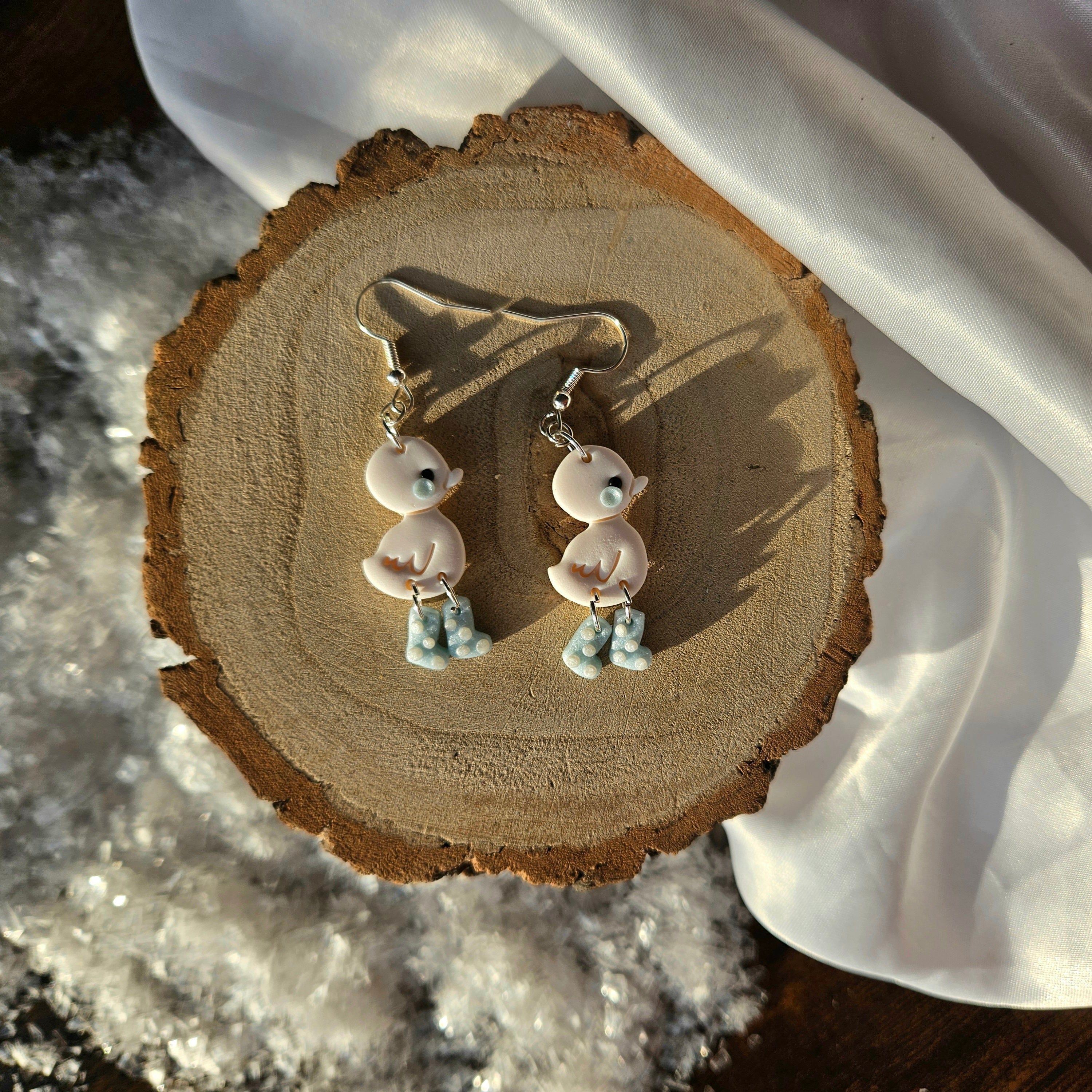 Snowy Ducks in Boots