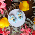 Ducks holding Bees