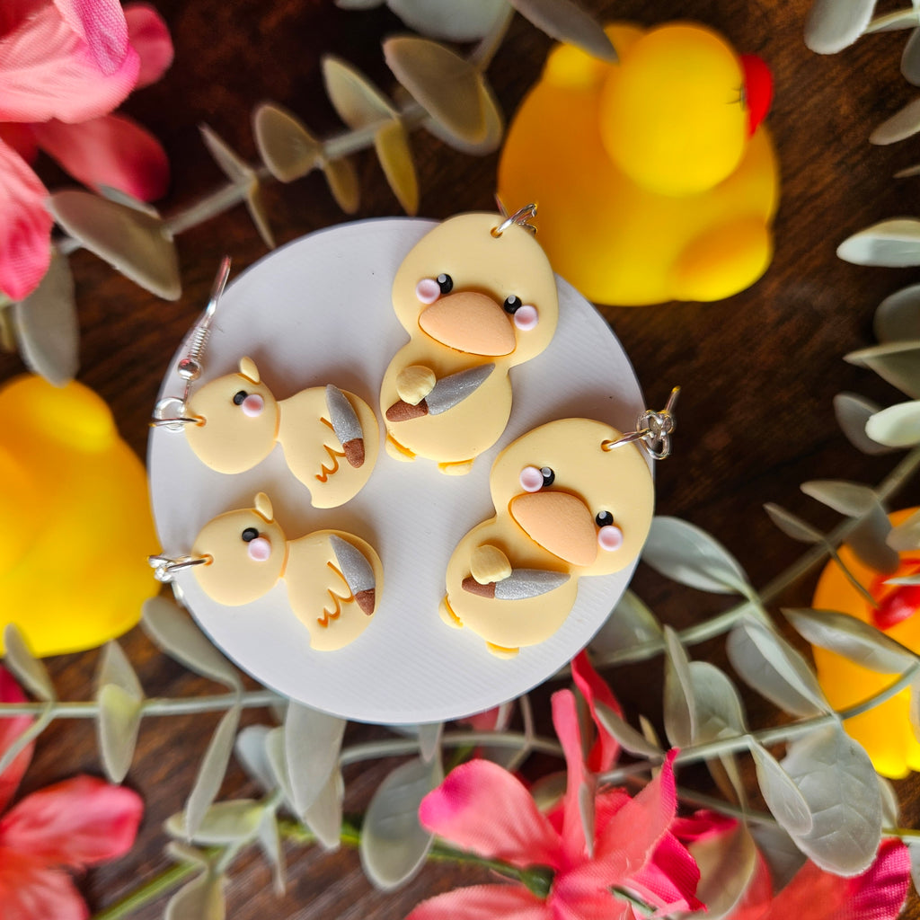 Ducks Holding a Knife