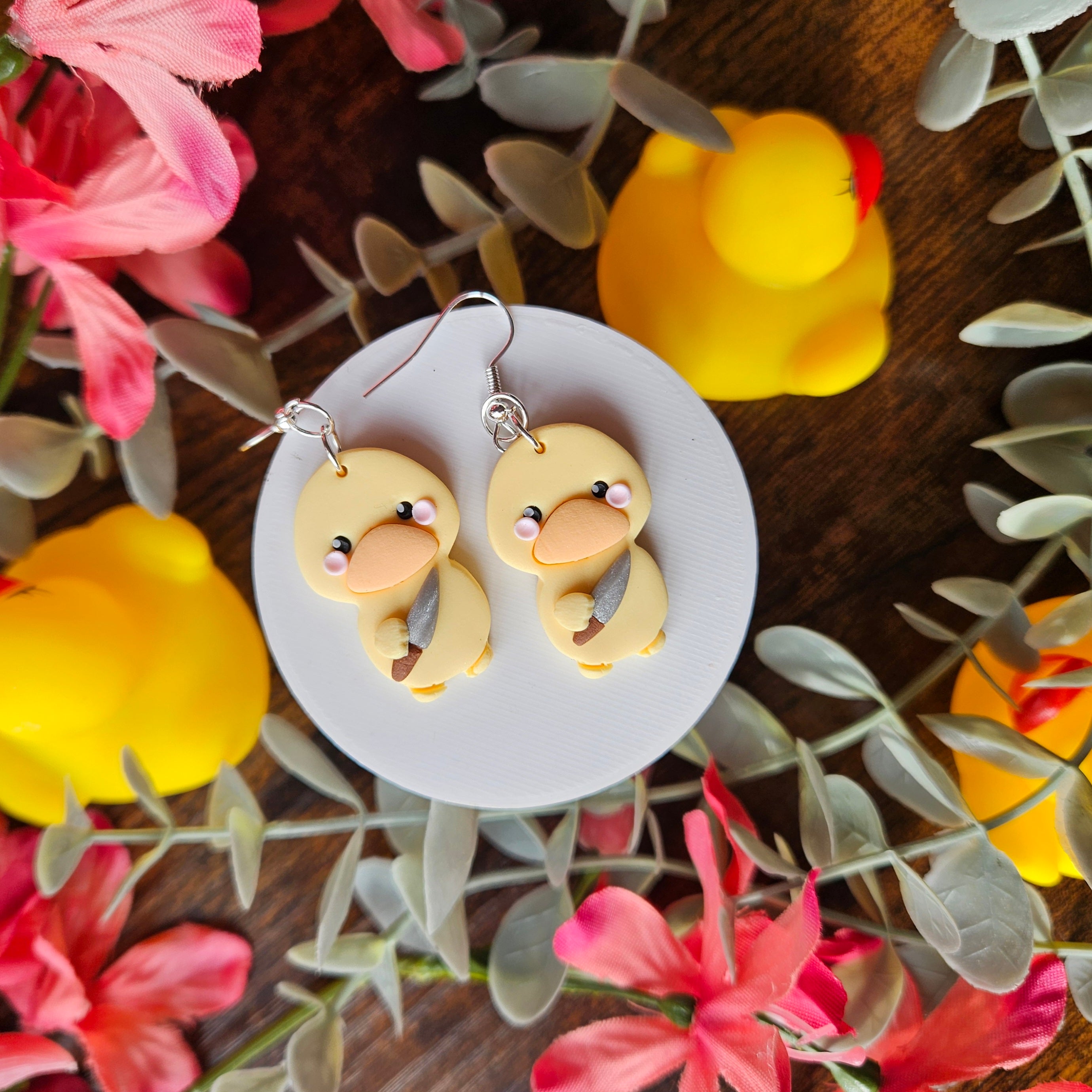 Ducks Holding a Knife