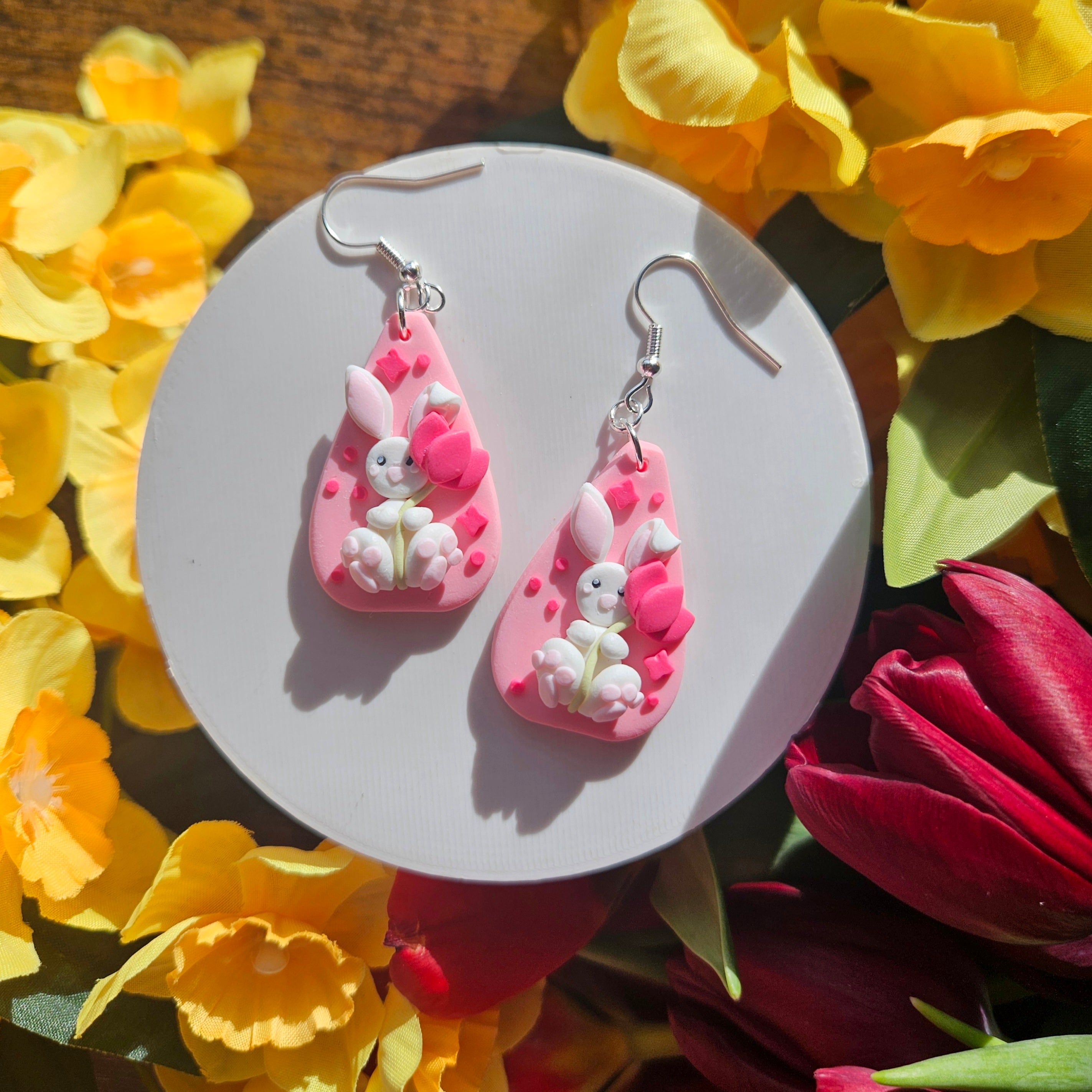 Spring Bunny Holding A Tulip