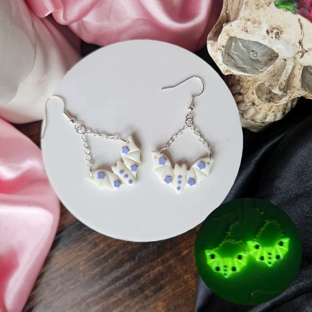 White with Purple accents Bats