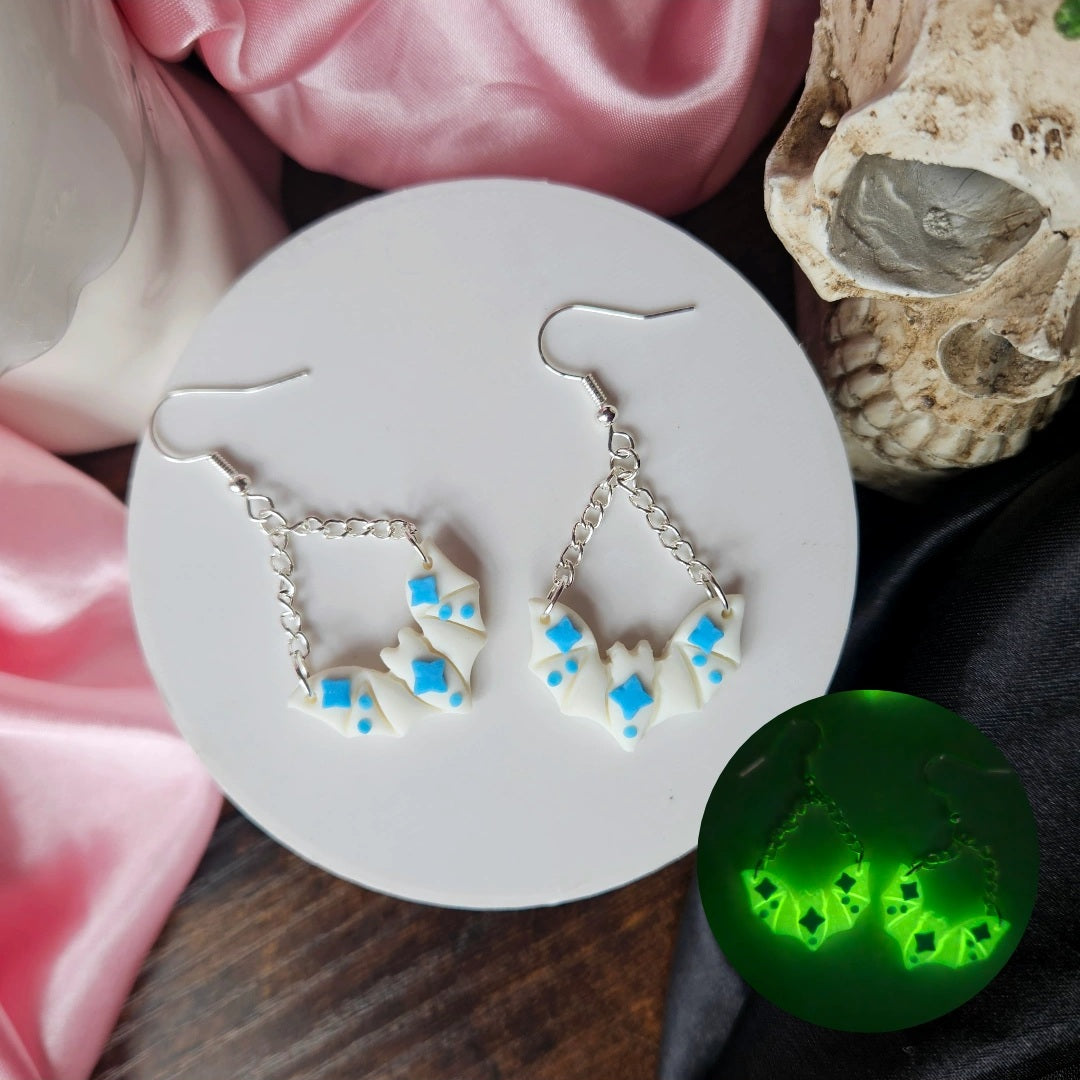 White with Blue accents Bats