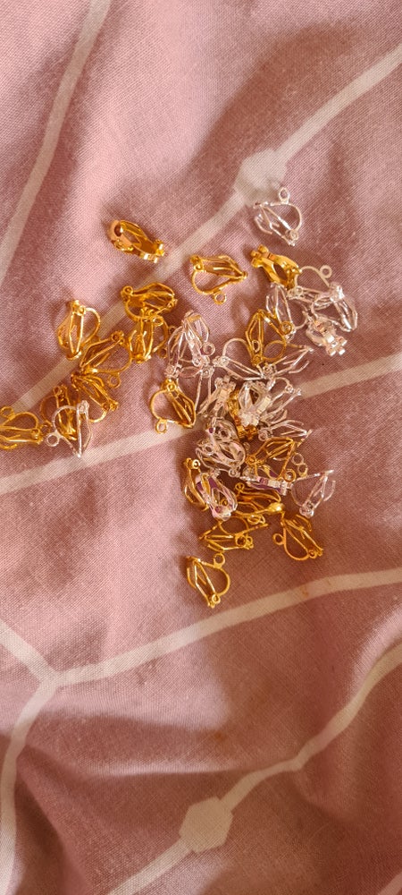 X CLIP ON EARRINGS